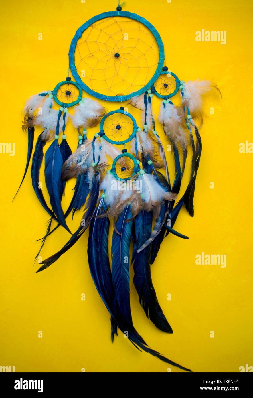 Dream catcher on old yellow wall Stock Photo Alamy