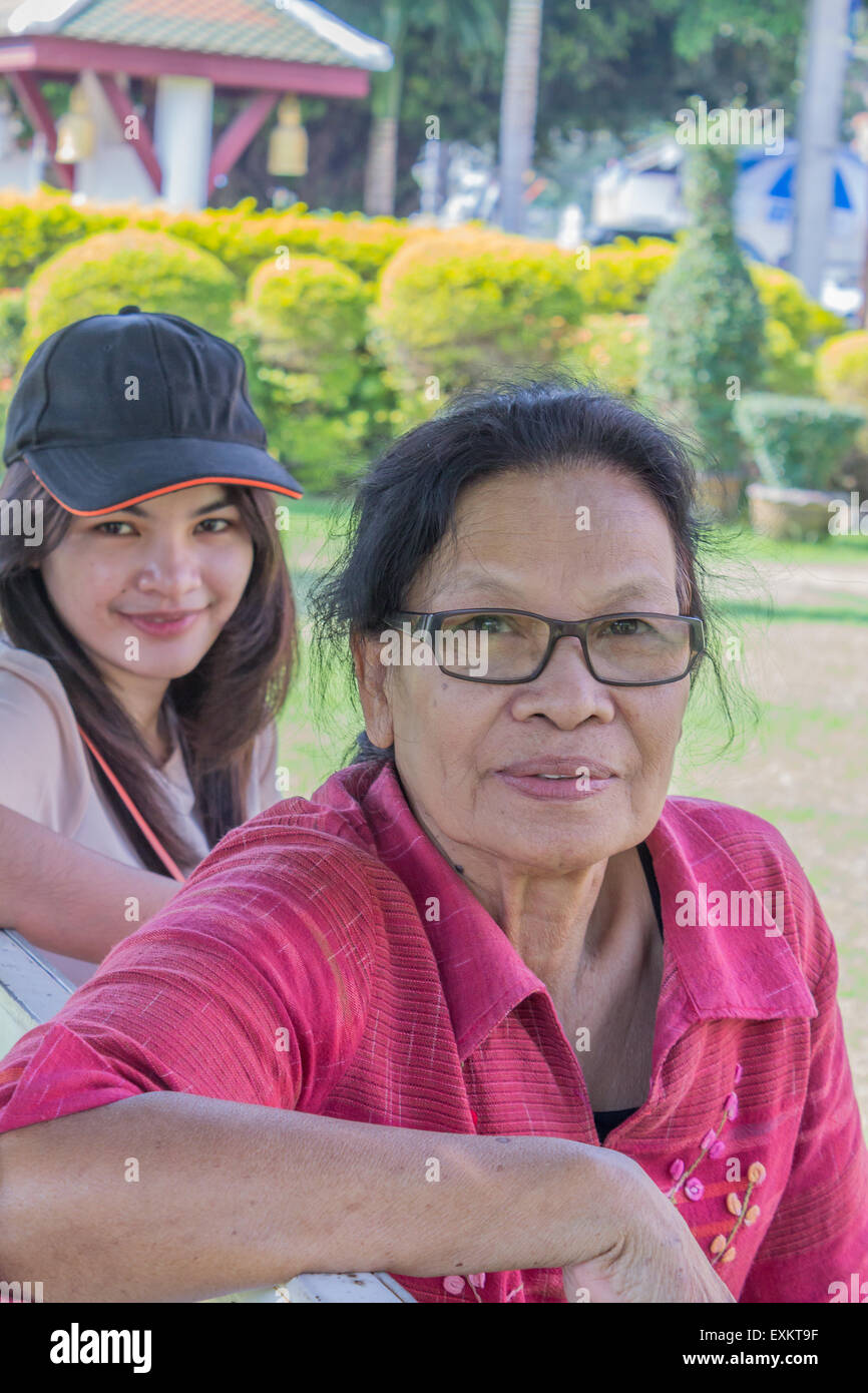 Portrait of Asian Thai beautiful grandmother and niece smiling healthy