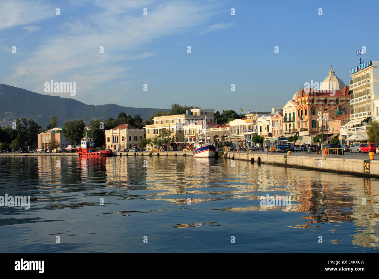 Capital city of Lesbos or Lesvos island, Mytilene and picturesque port reflected on sea surface. Stock Photo