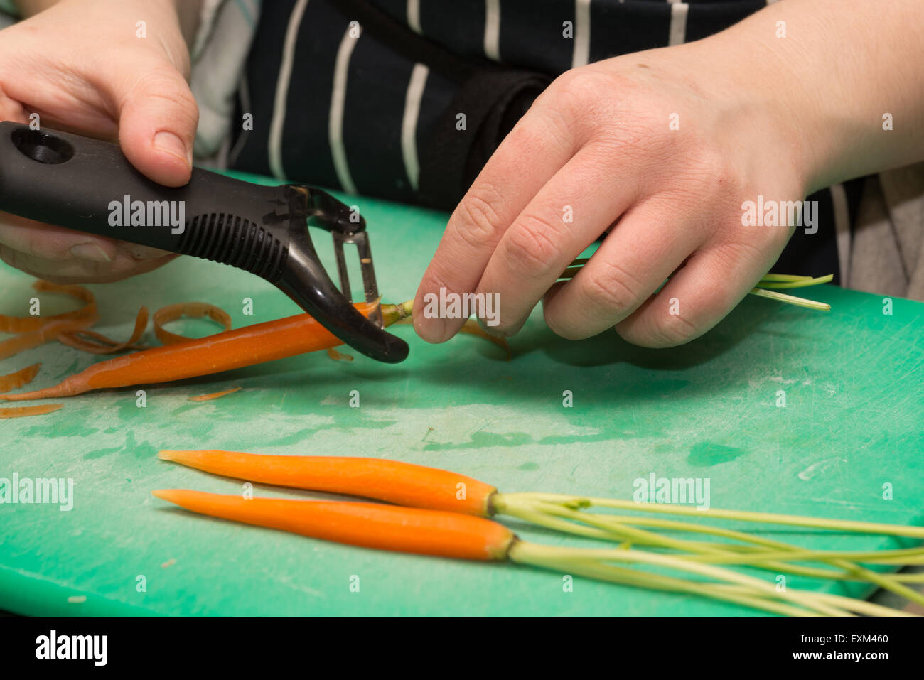 carrots, parsnips   , healthful eating, healthy eating, , green, ,  orange, organic, red, rustic, Chef, food hygiene, knife skil Stock Photo