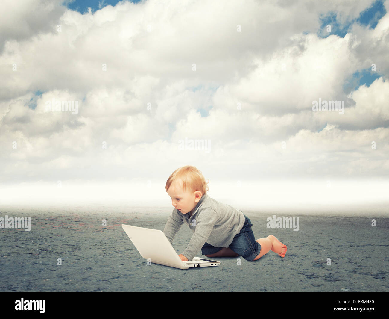 little child with notebook in desert Stock Photo
