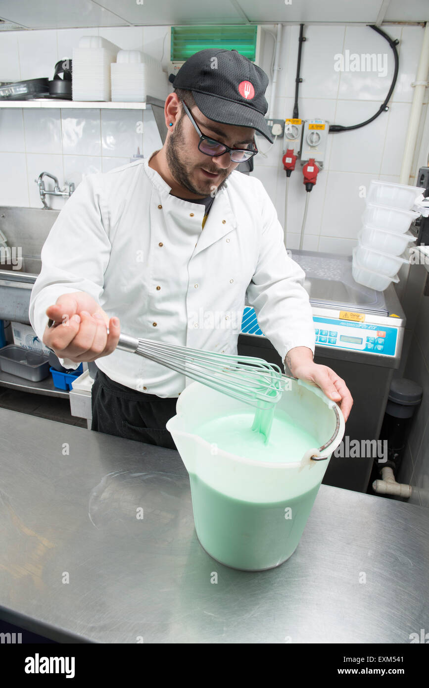 The Process of Making Ice Cream on a Street Ice Cream Maker. Instant Ice  Cream Preparation with a Spatula. Cook is Preparing Ice C Stock Photo -  Image of buyer, kitchen: 149039970