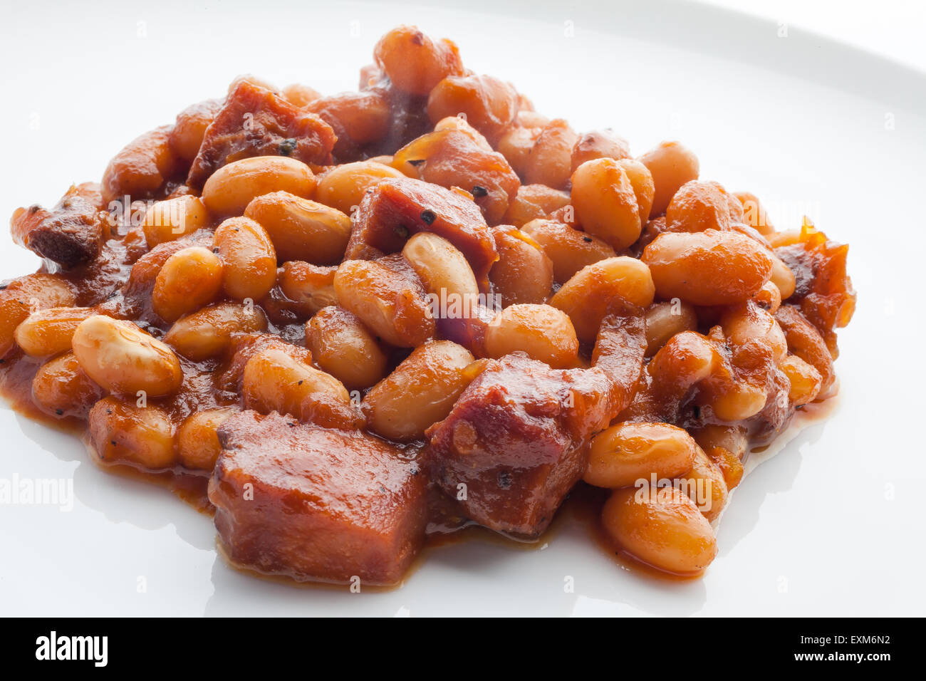 Baked beans in tomato sauce on white plate Stock Photo Alamy