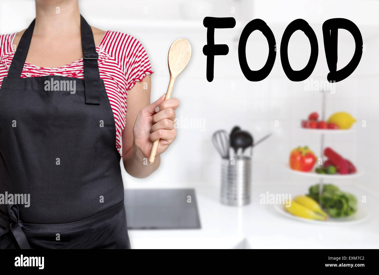 Food cook holding wooden spoon background Stock Photo - Alamy