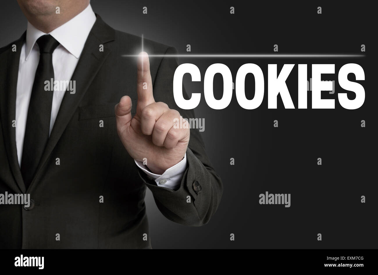 cookies touchscreen is operated by businessman. Stock Photo