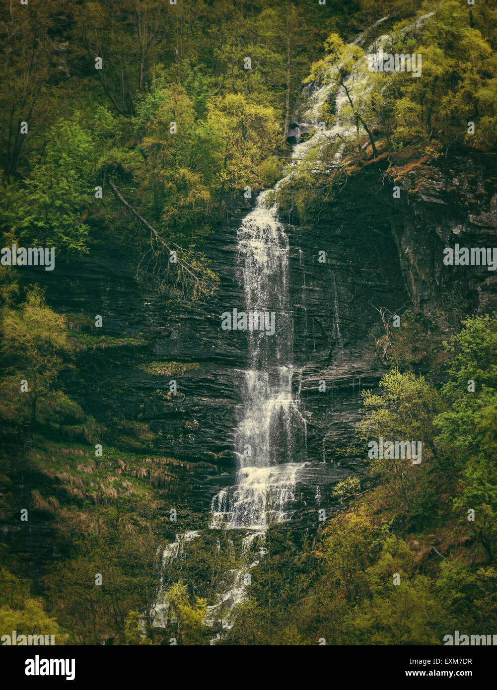 Waterfall up in the hills in Norway Stock Photo