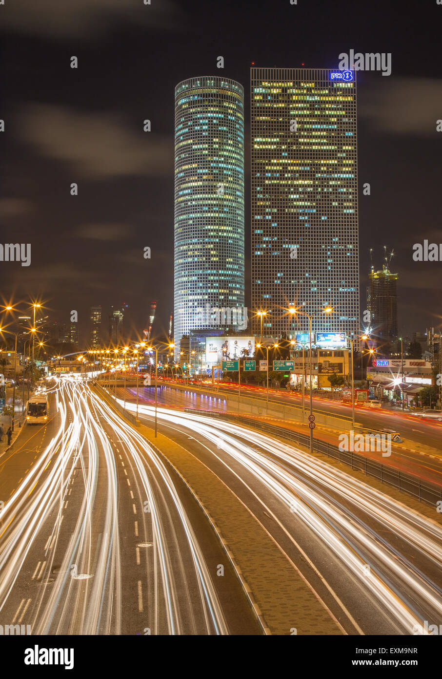 TEL AVIV, ISRAEL - MARCH 2, 2015: The skyscrapers of Azrieli Center at night by Moore Yaski Sivan Architects with measuring 187 Stock Photo