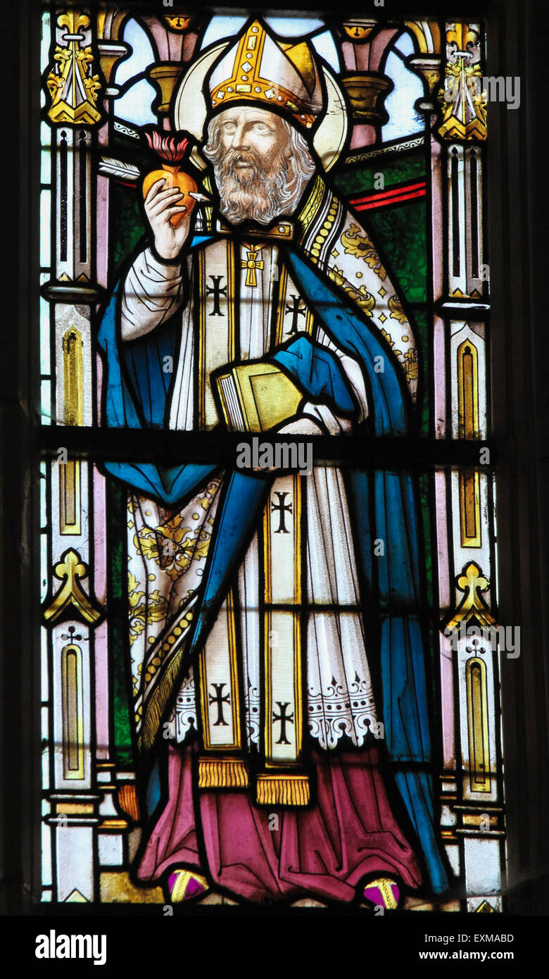 Stained glass window depicting Saint Augustine in the Church of Stabroek, Belgium. Stock Photo