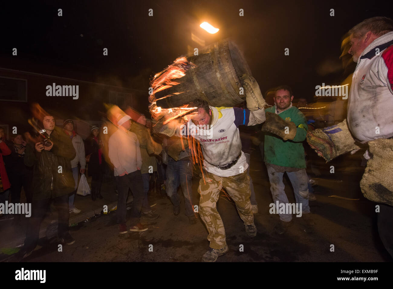 Collapsing barrel being carried through the street to mark Bonfire ...