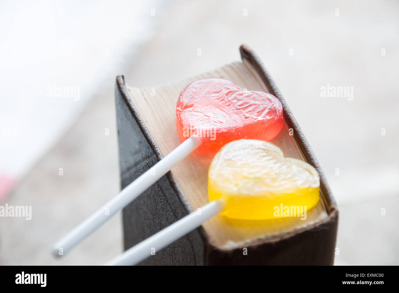 Two lollipops heart shaped, love background Stock Photo Alamy