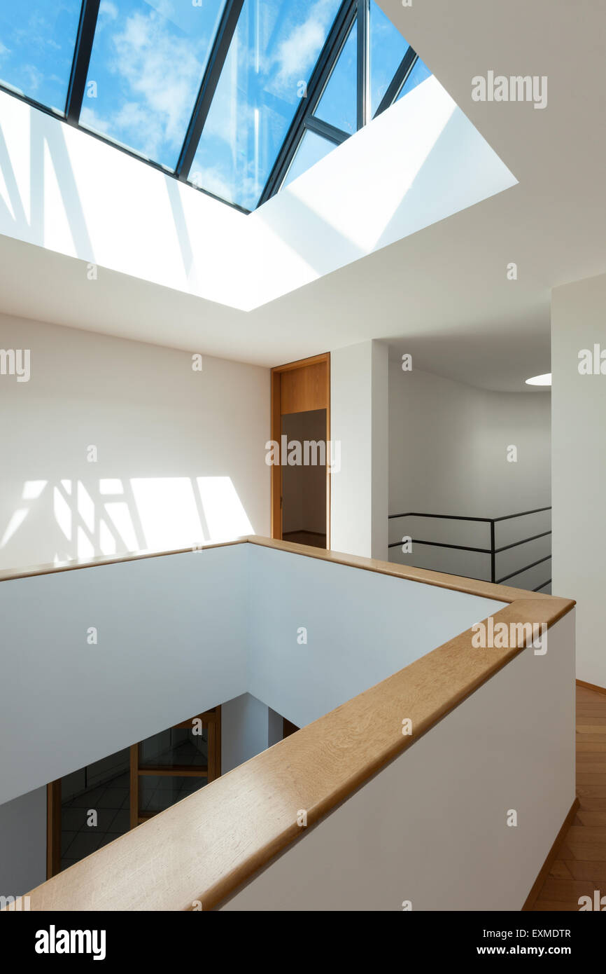 Architecture, Interiors of empty apartment, passage with skylight Stock Photo