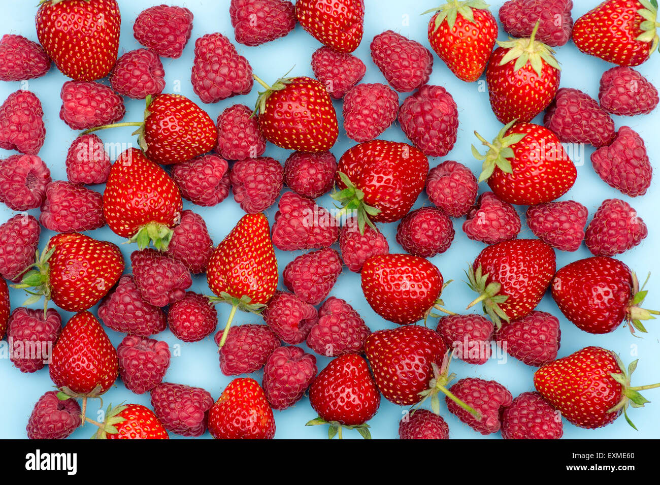 Fragaria × ananassa and Rubus idaeus. Fresh Strawberries and Raspberries pattern Stock Photo