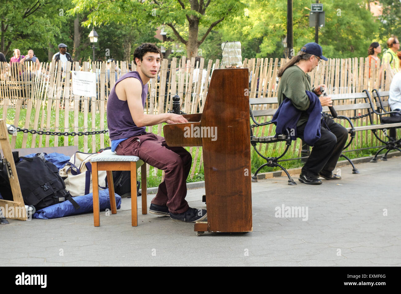 Street musician with piano at The Washington Square, Manhattan, New