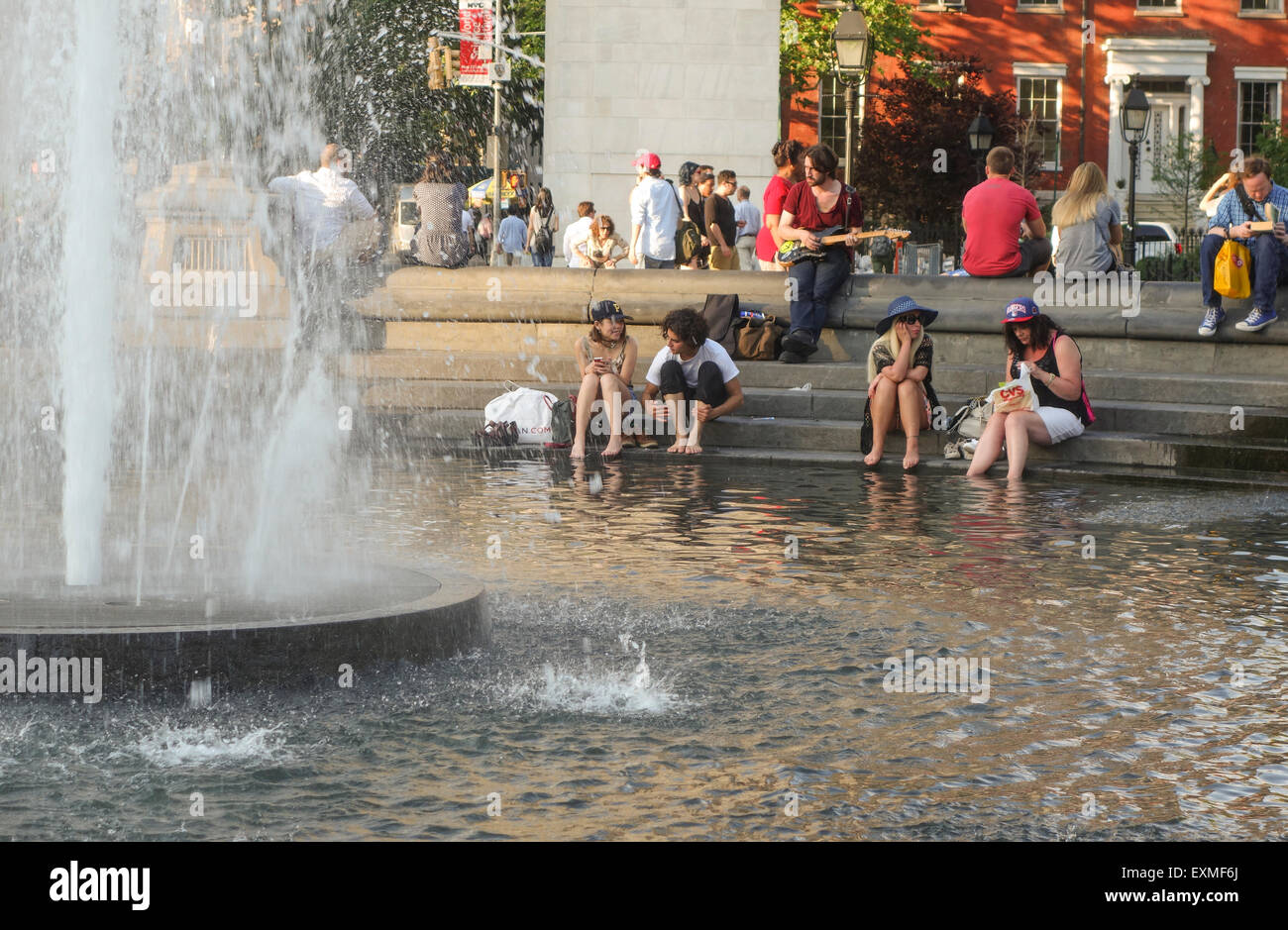 Tourists around Fountain at The Washington Square park, Manhattan, Greenwich Village, New York City, United States, USA. Stock Photo