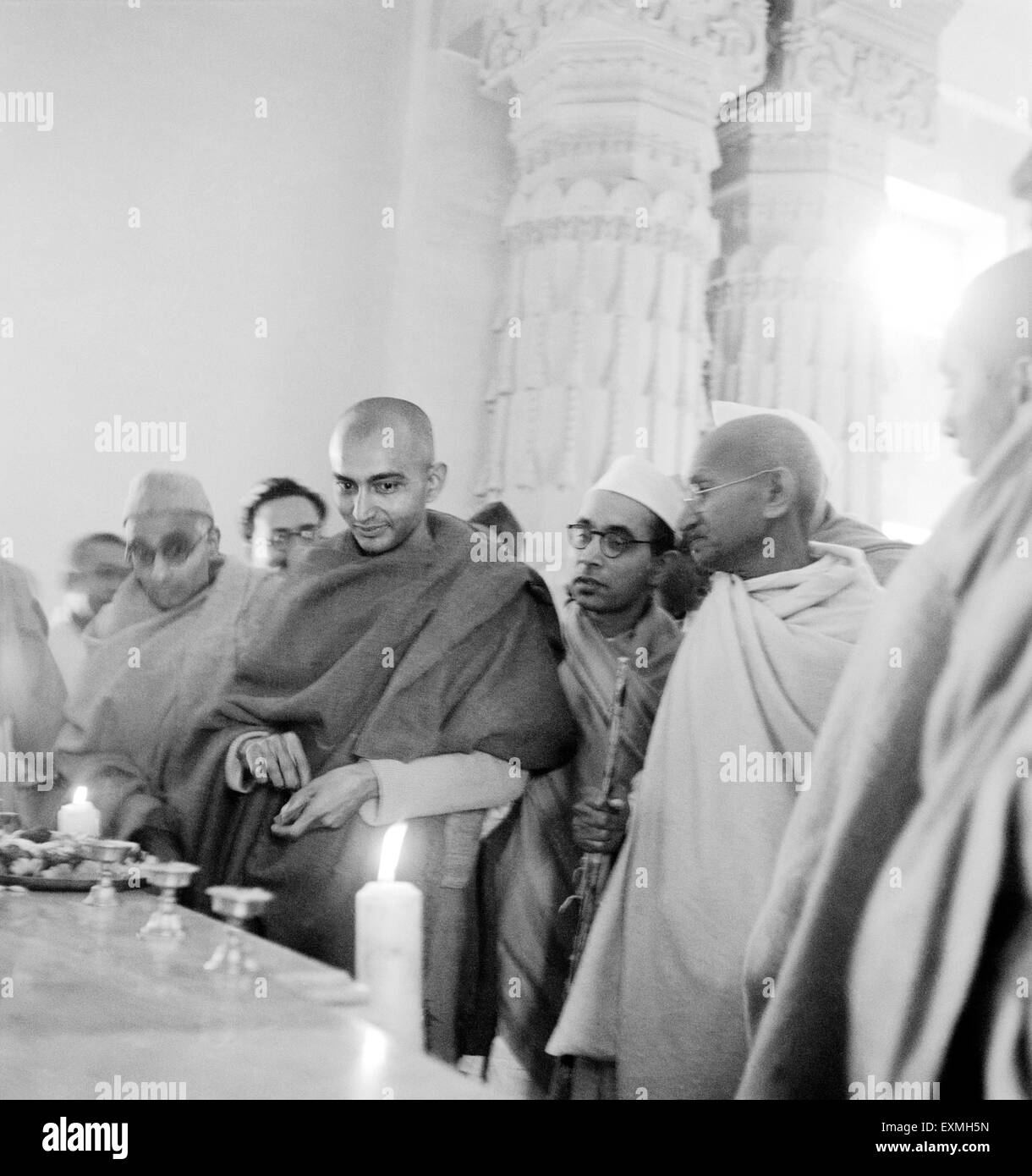 Mahatma Gandhi ; Pyarelal Nayar ; a Buddhist monk and others visiting Sarnath Temple ; Varanasi ; 1941 ; India NO MR Stock Photo
