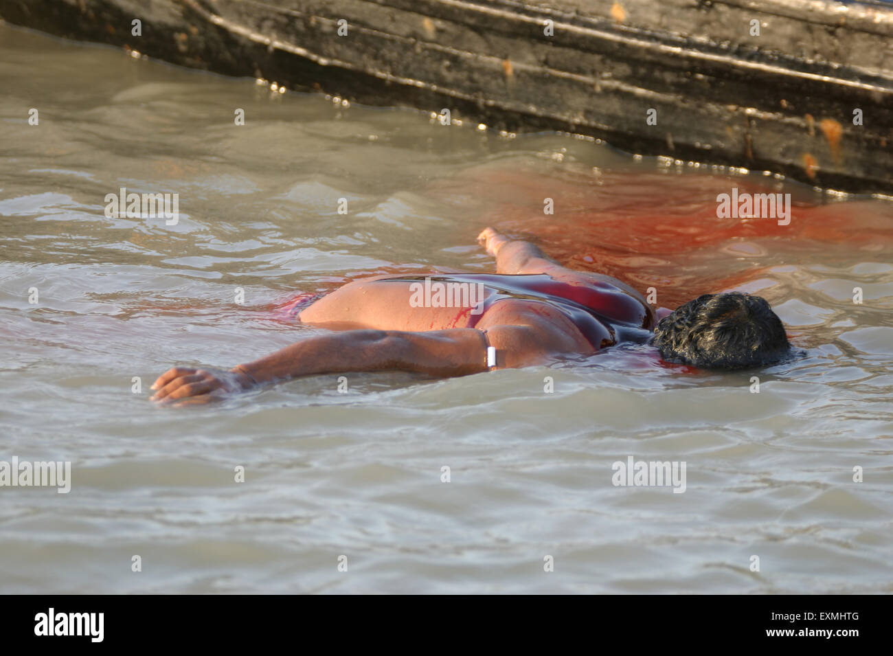 Dead body in water hi-res stock photography and images - Alamy