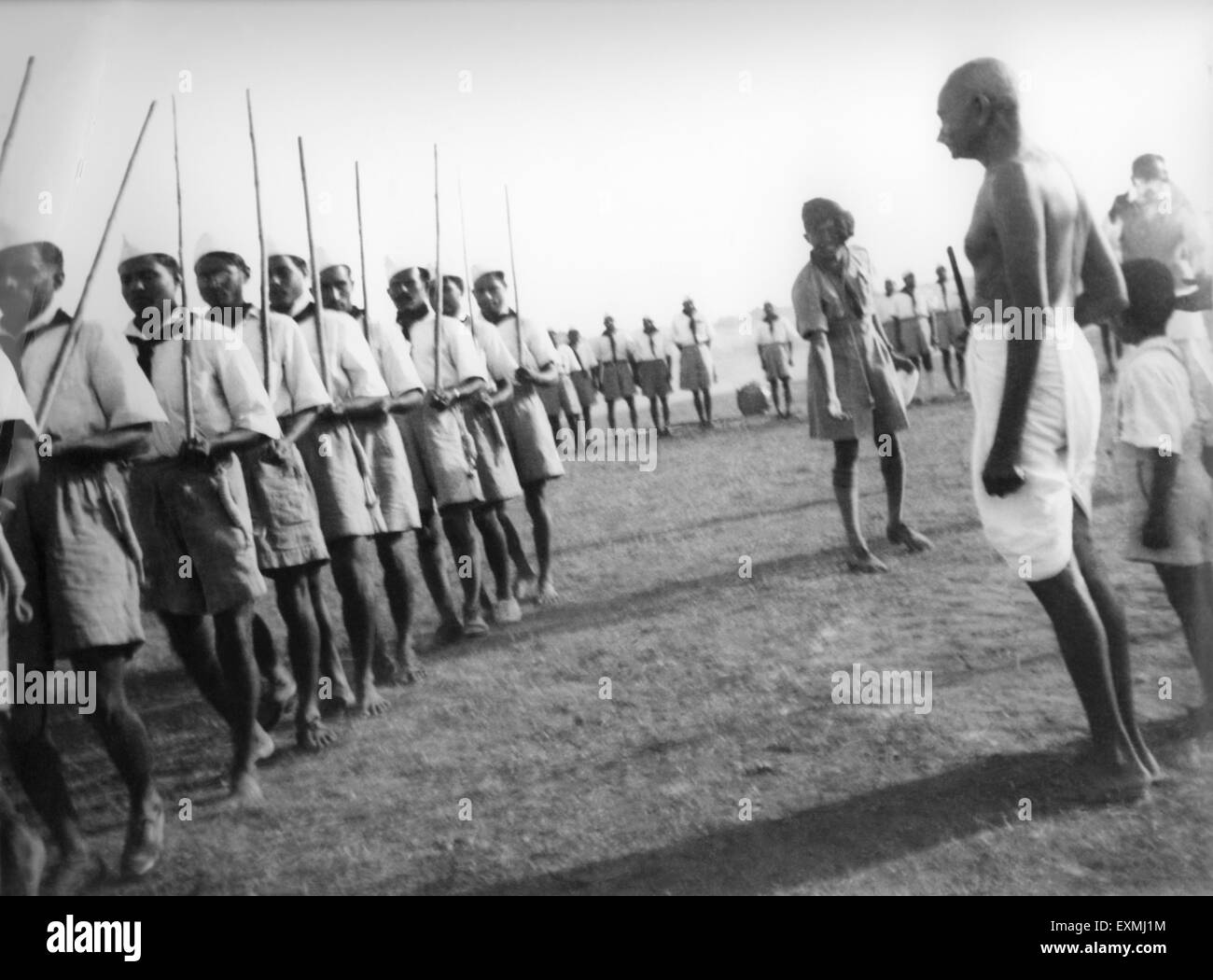 Ghandi Gym Routine Mahatma Gandhi and grandson Kahandas watching an exercise of volunteers ...
