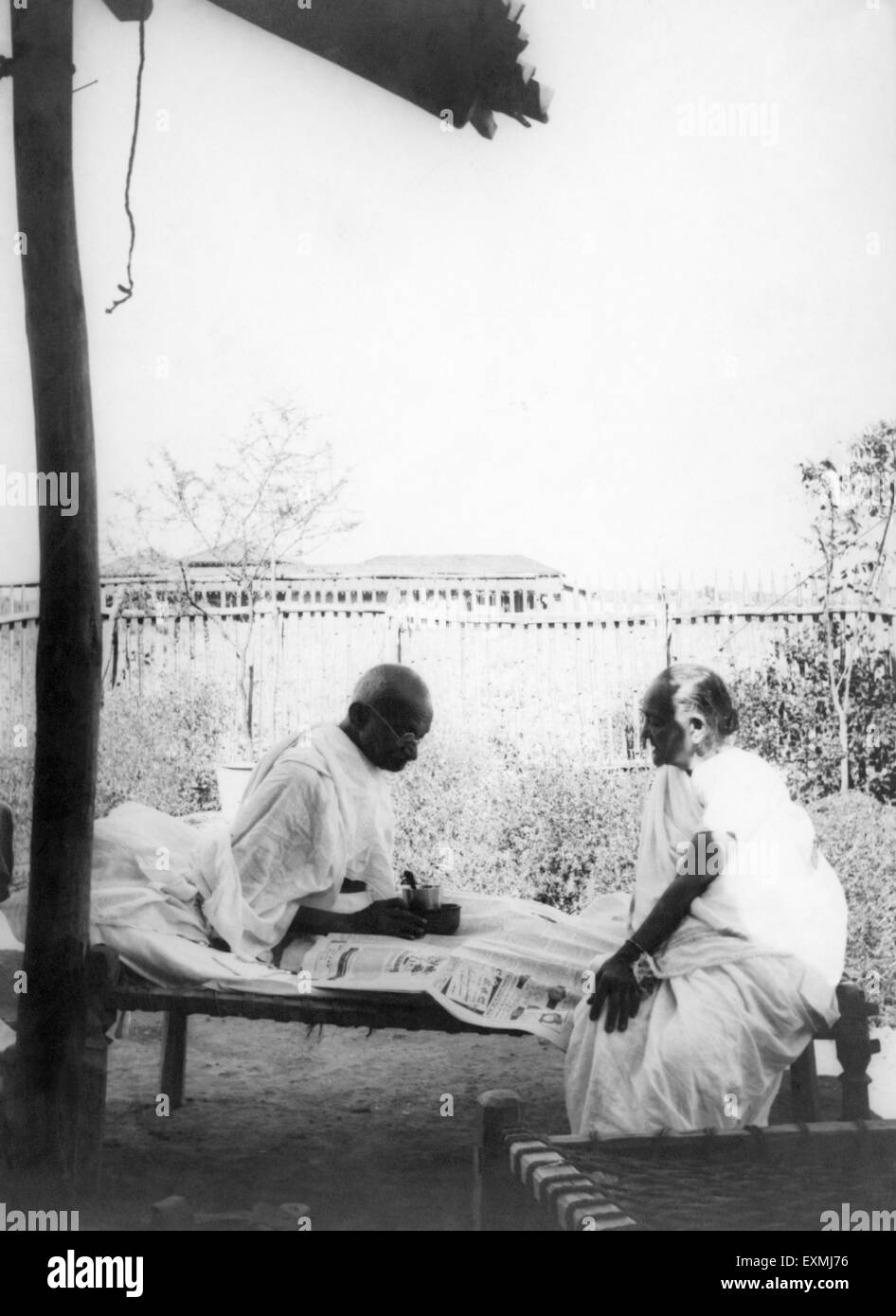 Kasturba Gandhi and Mahatma Gandhi at Sevagram Ashram ; 1938 NO MR Stock Photo