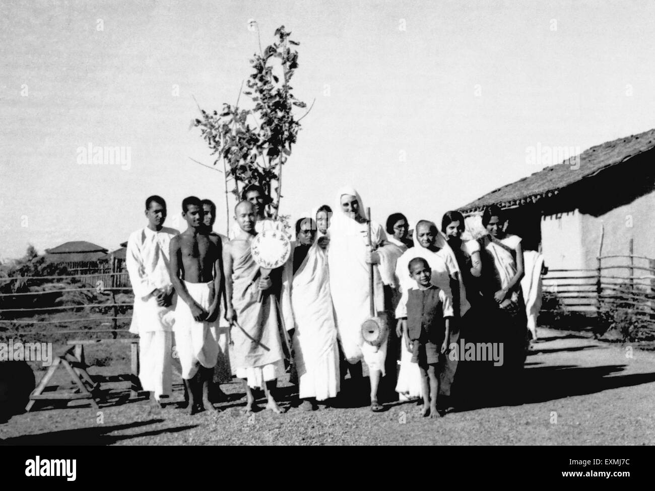 Group photo at Sevagram Ashram ; c 1938 3rd r Kasturba Gandhi; in f of her her grandson Kahandas Mirabehn Amtus Salam Stock Photo