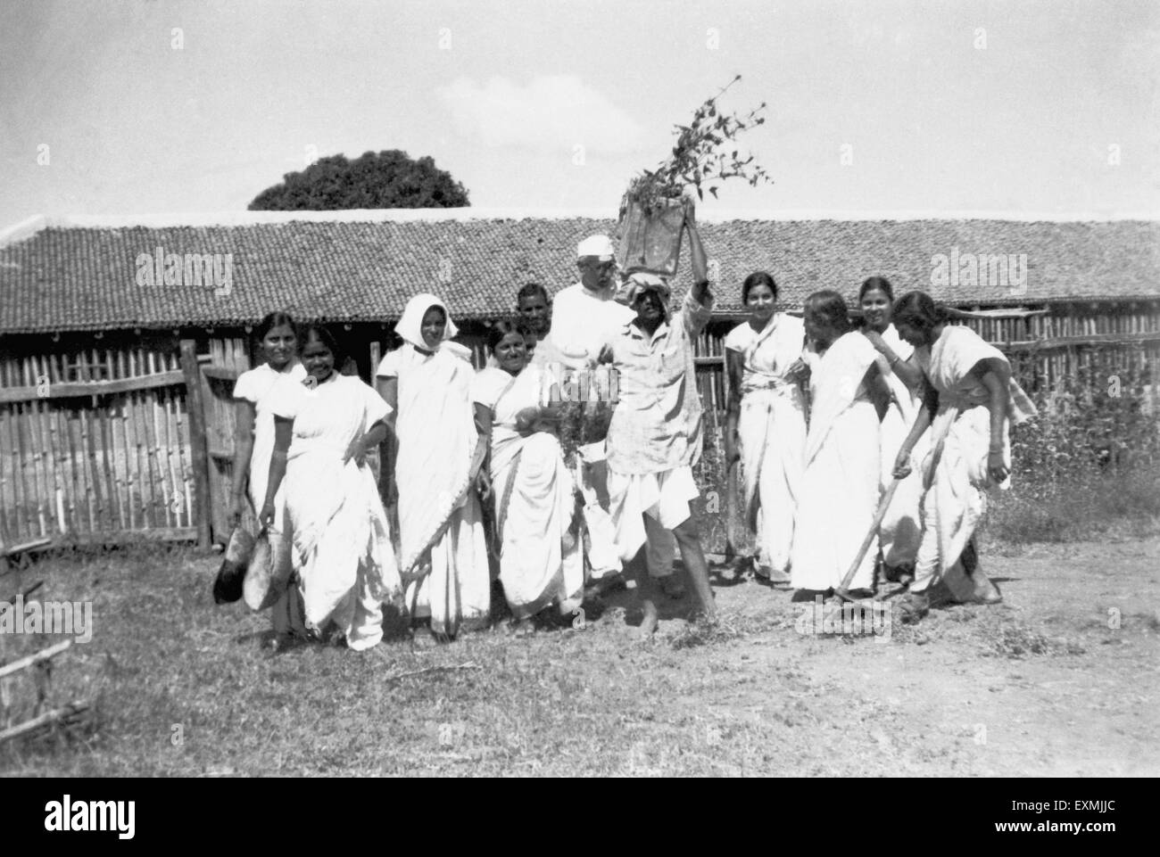 Volunteers during the village cleaning campaign at Segaon village ; 1936 NO MR Stock Photo