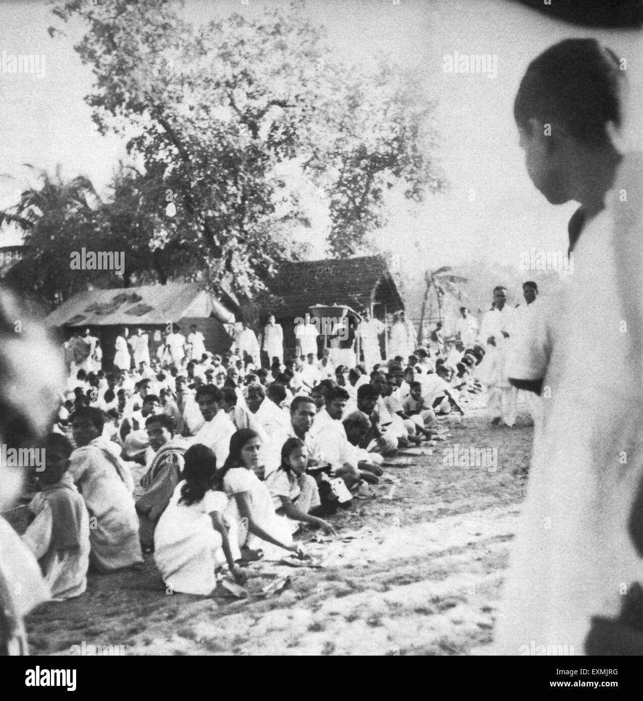 People waiting to meet Mahatma Gandhi after the riots between Hindus and Muslims in Chandipur ; Noakhali East Bengal Stock Photo