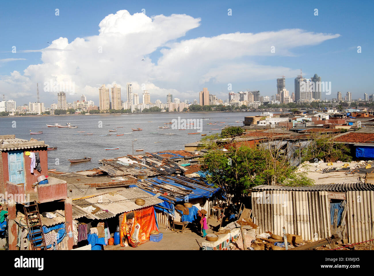 Huts and background city skyline ; Worli Village ; Worli Koliwada