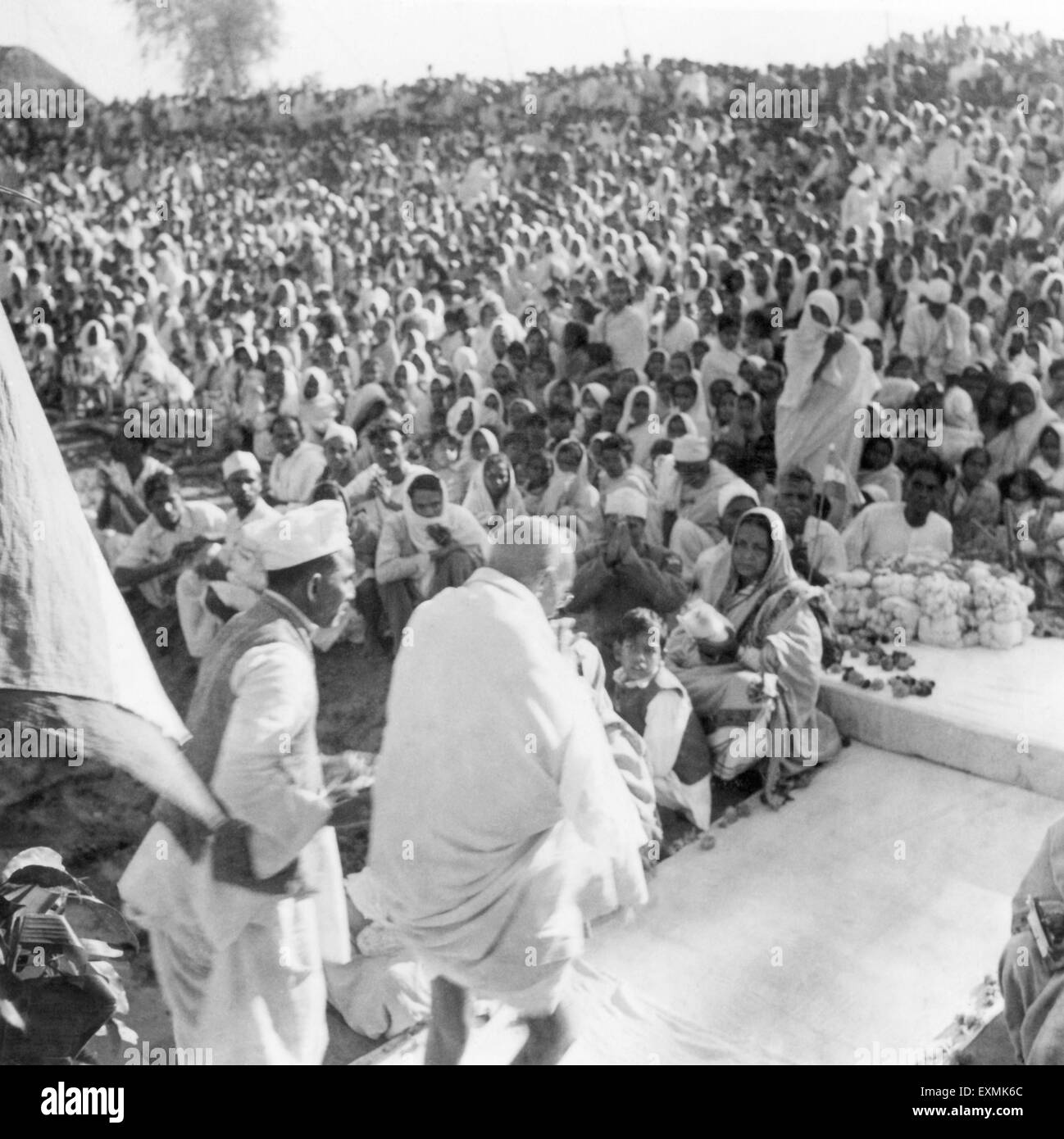 Mahatma Gandhi arriving at a mass meeting in Bengal ; 1945 NO MR Stock ...