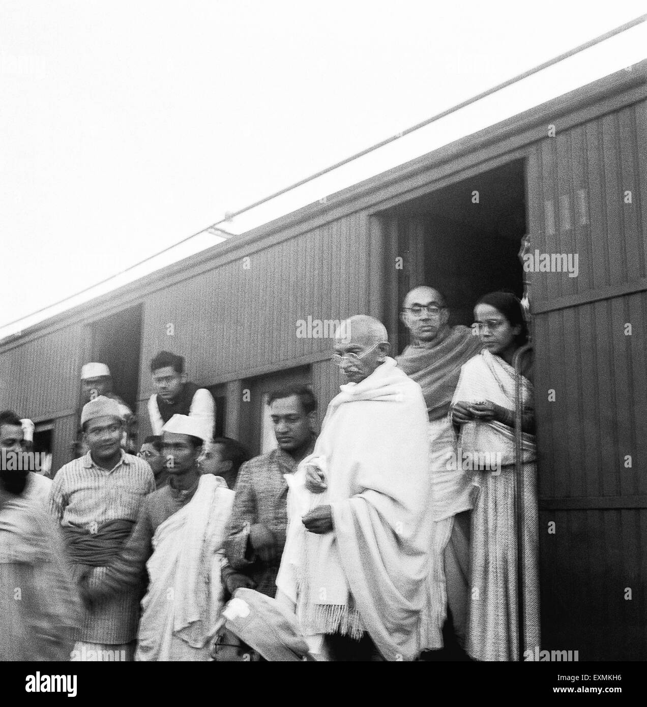 Mahatma Gandhi collecting donations Harijan Fund train station Assam Ramkrishna Bajaj Pyarelal Nayar Prabhatibehn Jayaprakash Stock Photo