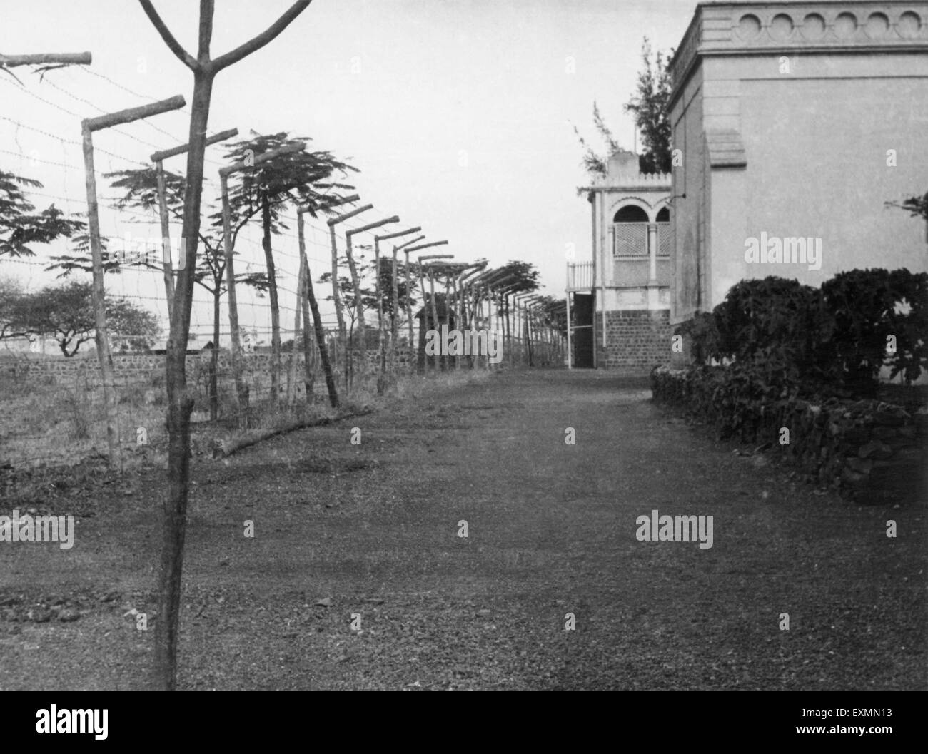security barbed wire fence building, 1950, India, Asia, old vintage 1900s picture Stock Photo