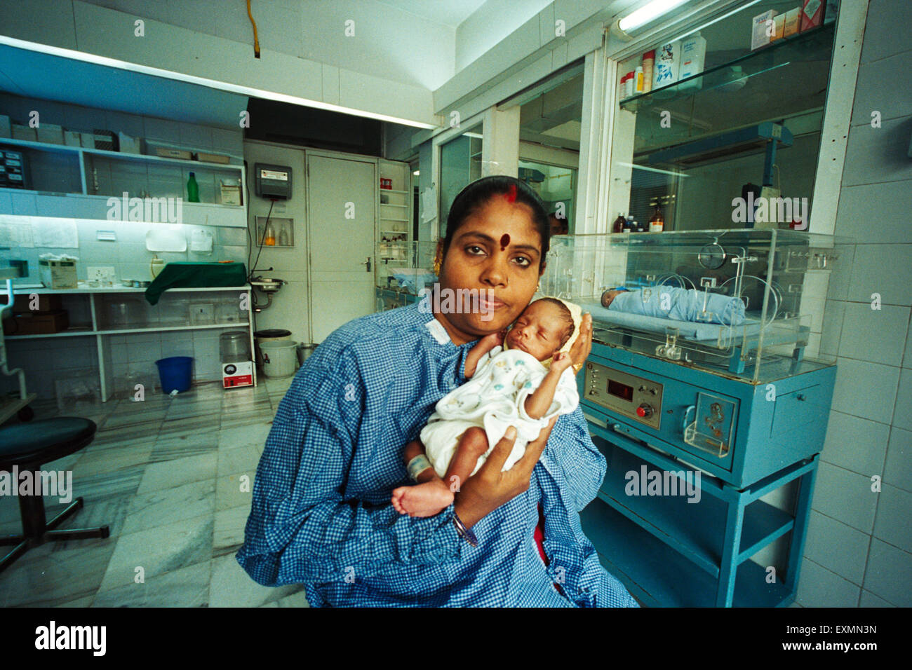 Woman with just born baby, Bombay, Mumbai, Maharashtra, India, Asia Stock Photo
