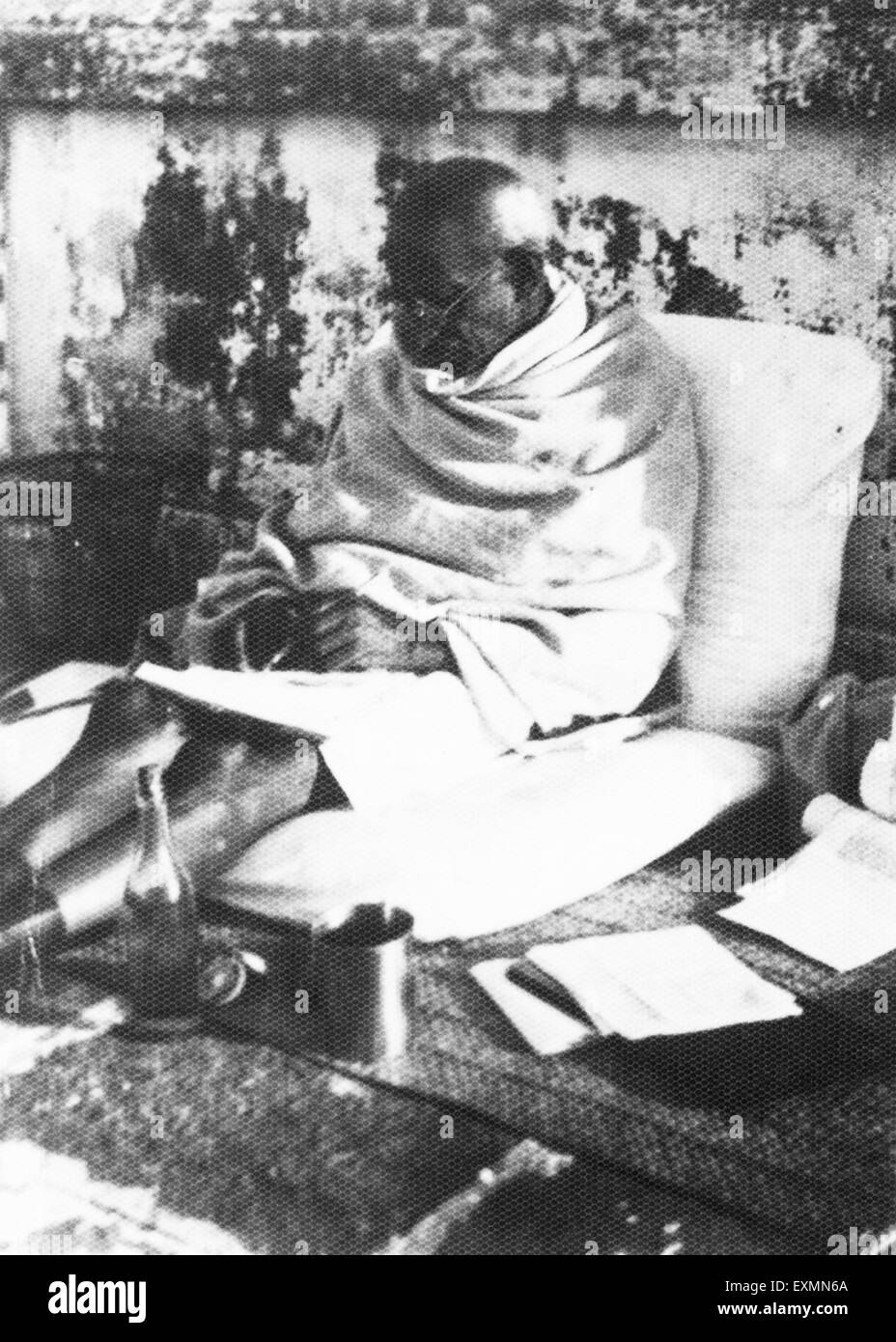 Mahatma Gandhi writing ; Sevagram Ashram ; 1935 blur photograph ; India NO MR Stock Photo