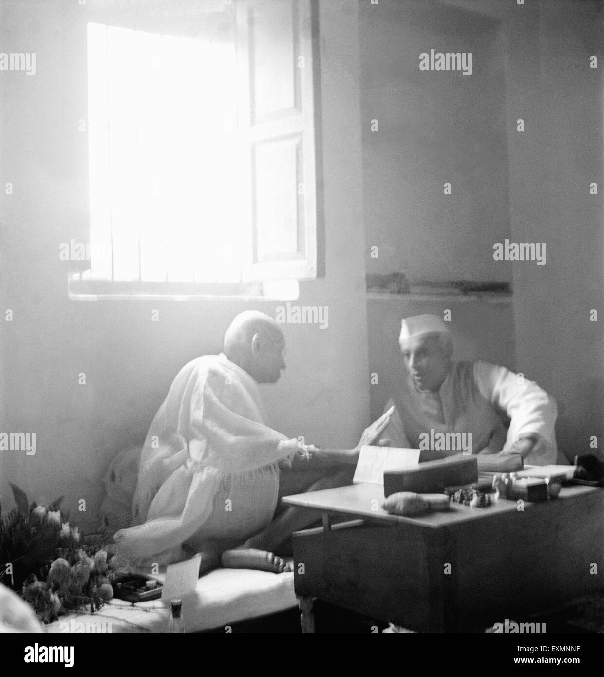 Mahatma Gandhi talking with Jawaharlal Nehru at Bhangi sweeper's Colony ...