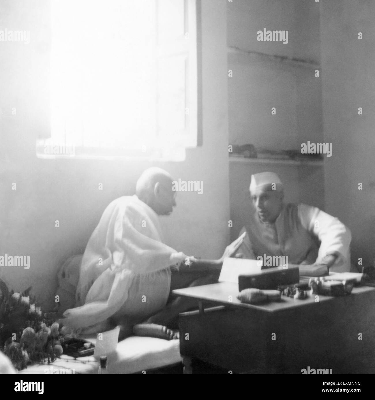 Mahatma Gandhi talking with Jawaharlal Nehru at Bhangi sweeper's Colony ...