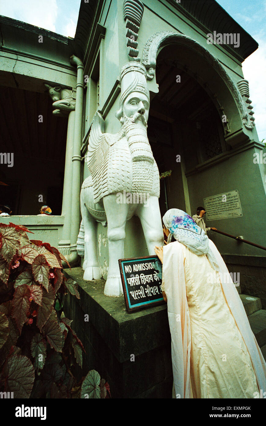 Parsi woman praying Parsi Fire Temple on Parsi new year mumbai India Stock Photo
