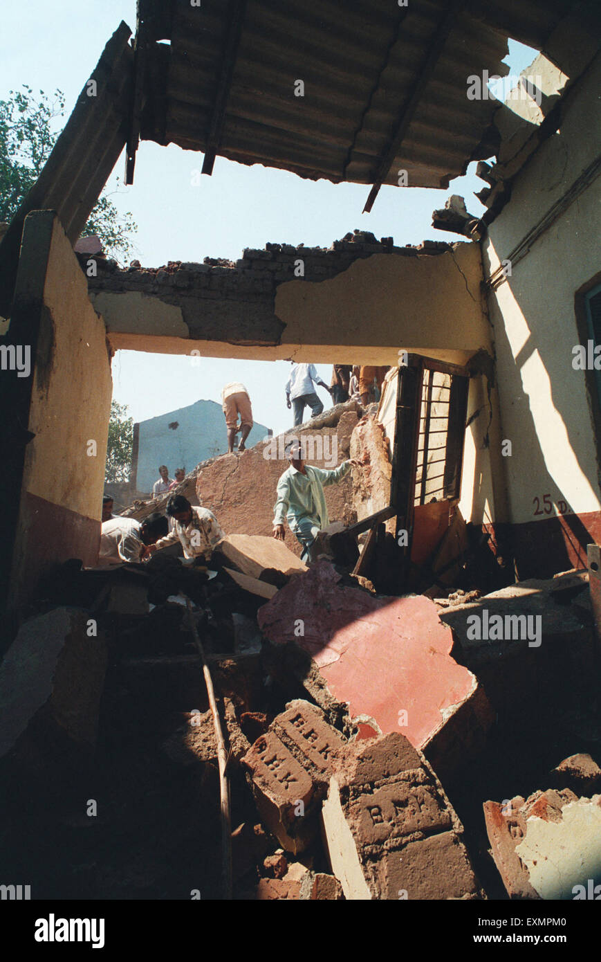 demolishing breaking illegal unauthorised structure bombay mumbai maharashtra india asia Stock Photo