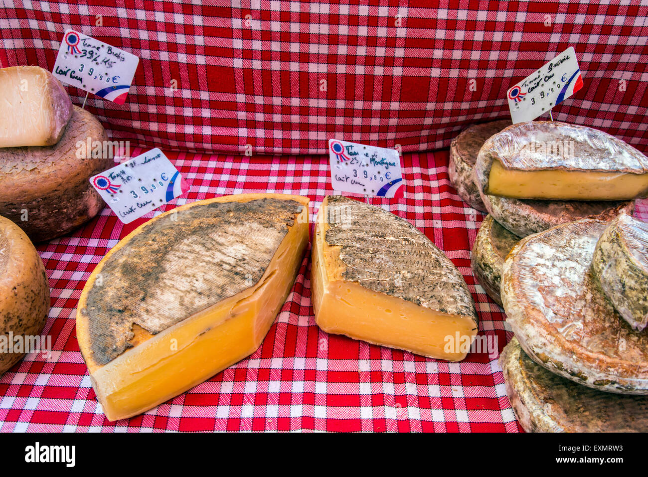 Local cheeses on sale at the market, Carpentras, Provence, France Stock Photo