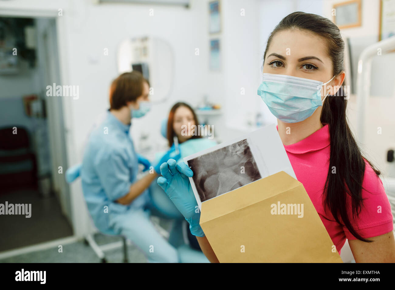 Dentist with Xrays in the hands of Stock Photo Alamy