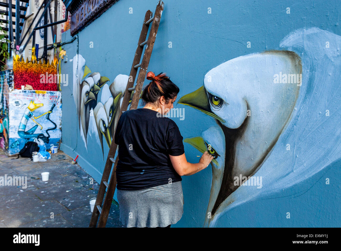 Graffiti/Street Artist At Work, Brick Lane, London, Engalnd Stock Photo