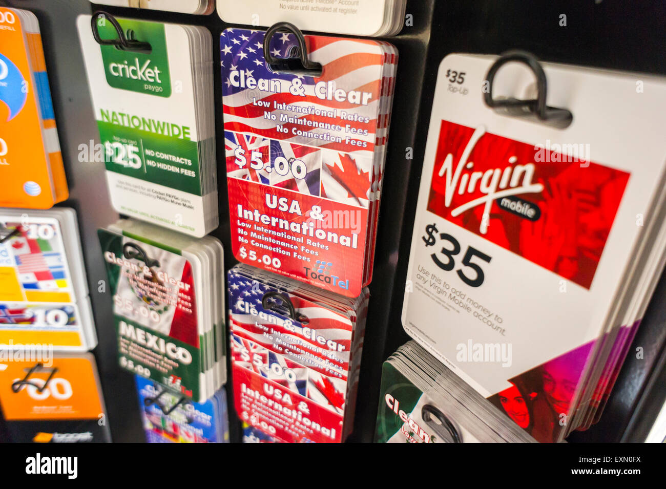 A display of international and domestic prepaid calling cards from various carriers in a store in New York on Tuesday, July 14, 2015  (© Richard B. Levine) Stock Photo