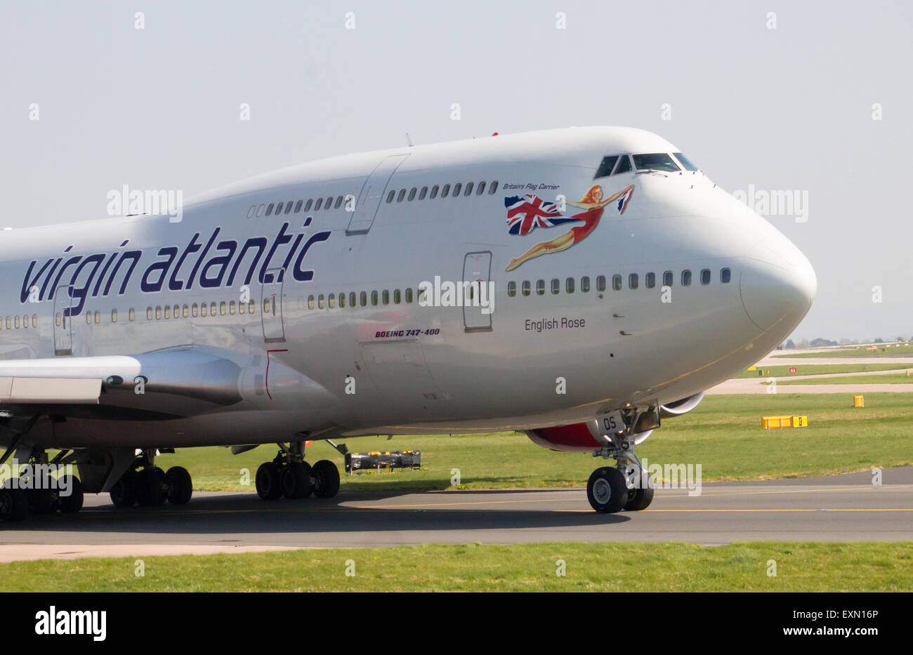 Virgin Atlantic Boeing 747-400 'English Rose' taxiing on Manchester Airport taxiway. Stock Photo