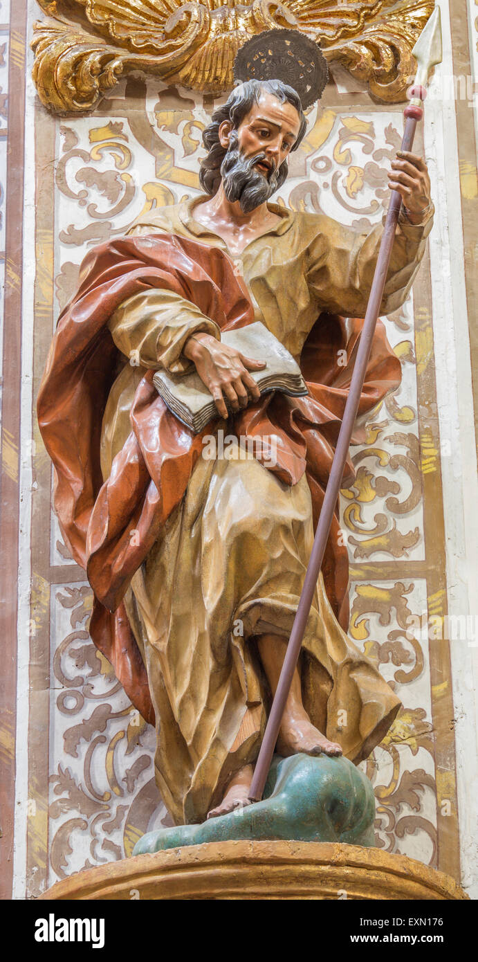 GRANADA, SPAIN - MAY 29, 2015: The the carved statue of st. Thomas the apostle in church Nuestra Senora de las Angustias by Pedr Stock Photo