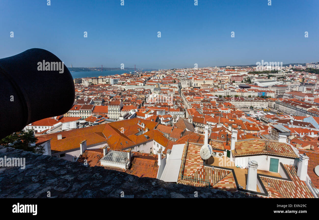 Portugal, Lisbon, a cannon at Castelo de Sao Jorge overlooking the Baixa Pombaline, the Pombaline Downtown of Lisbon Stock Photo