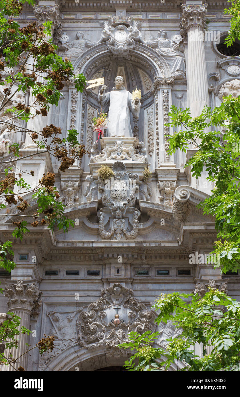 Granada - The baroque facade of church Basilica San Juan de Dios. Stock Photo