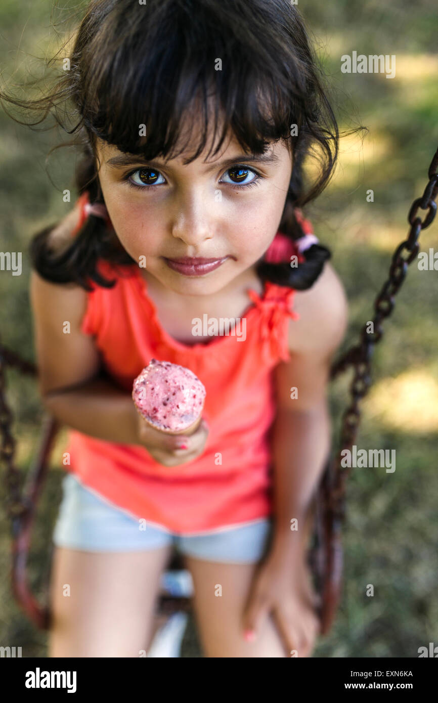 Portrait of little girl with ice cream cone Stock Photo 