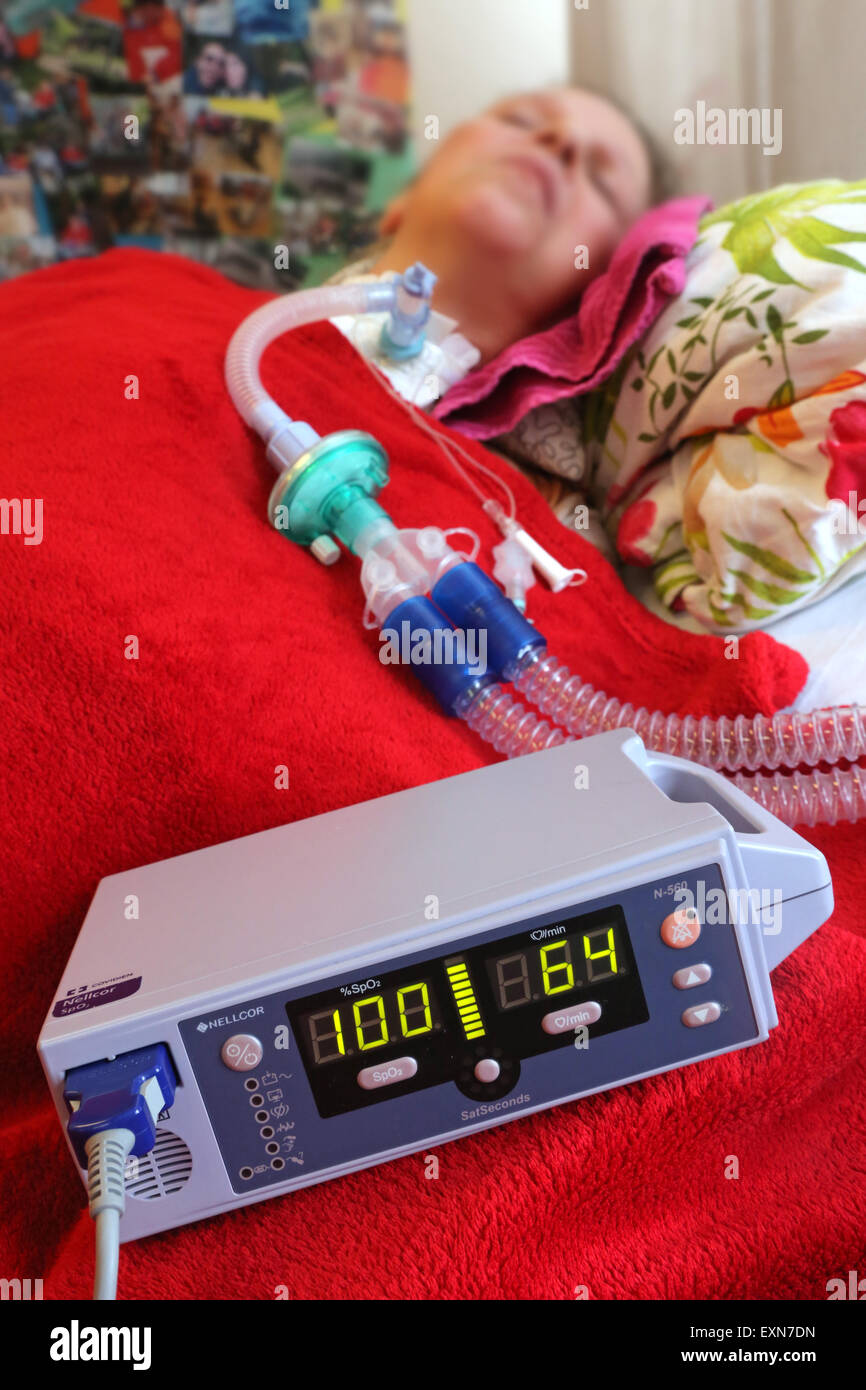 Patient who needs artificial respiration is monitored by a pulse oxymeter in a care center in Essen / Germany Stock Photo