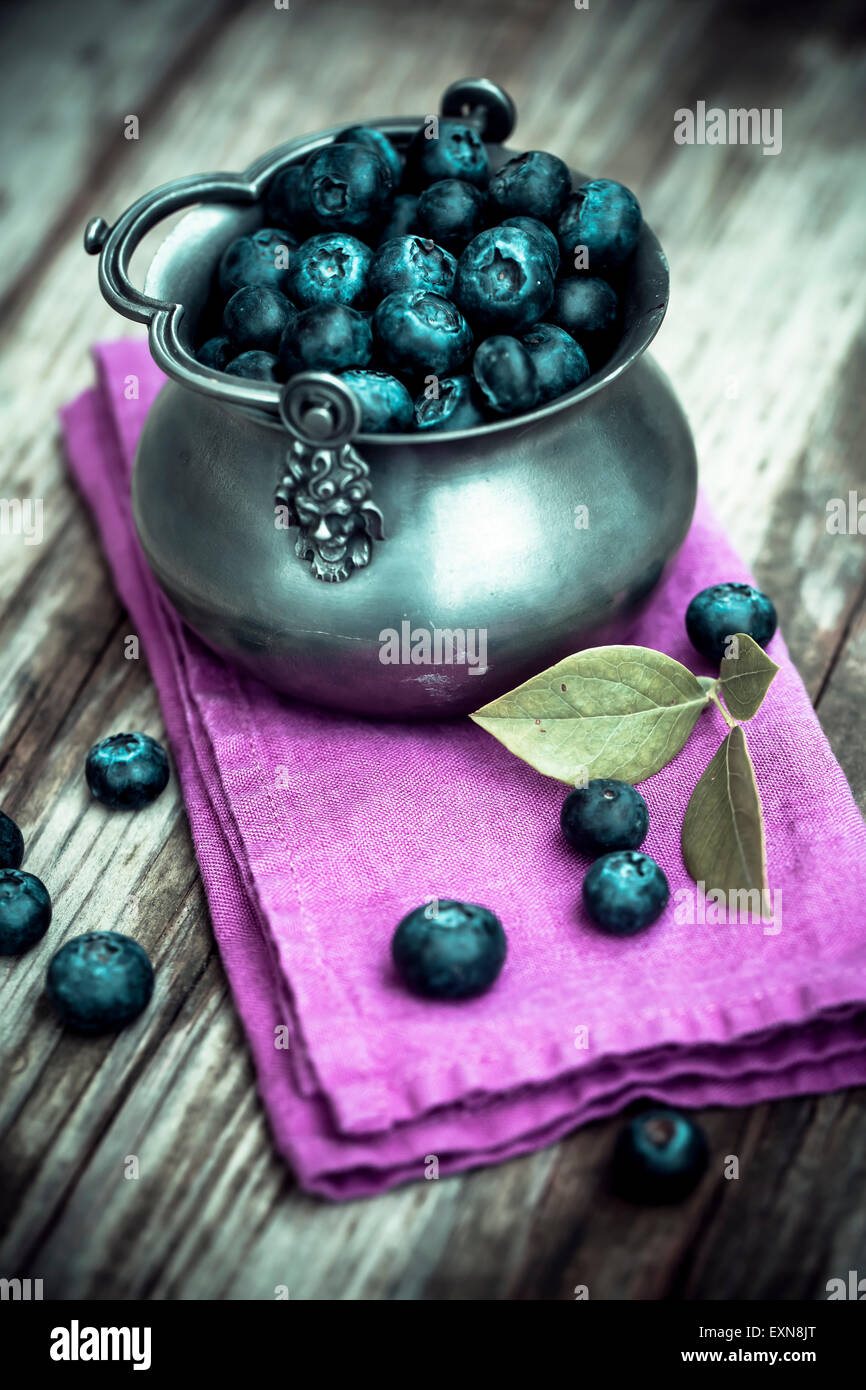Blueberries in zinc bowl Stock Photo Alamy