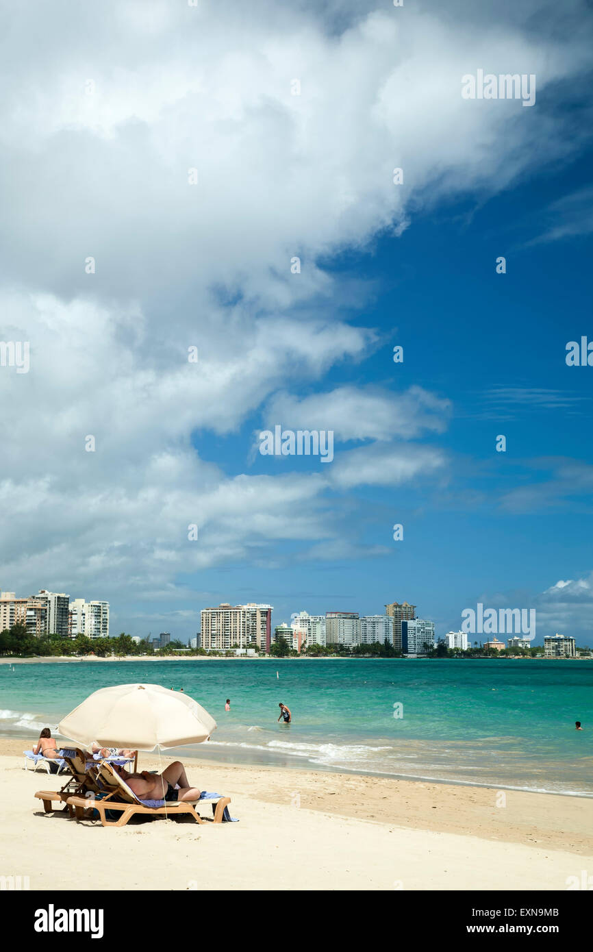 Beach goers, Isla Verde Beach, Puerto Rico Stock Photo