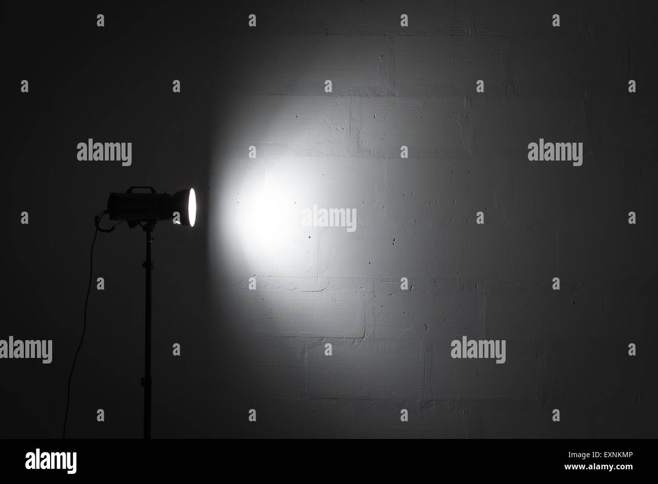 Professional photo studio strobe with reflector on tripod Stock Photo