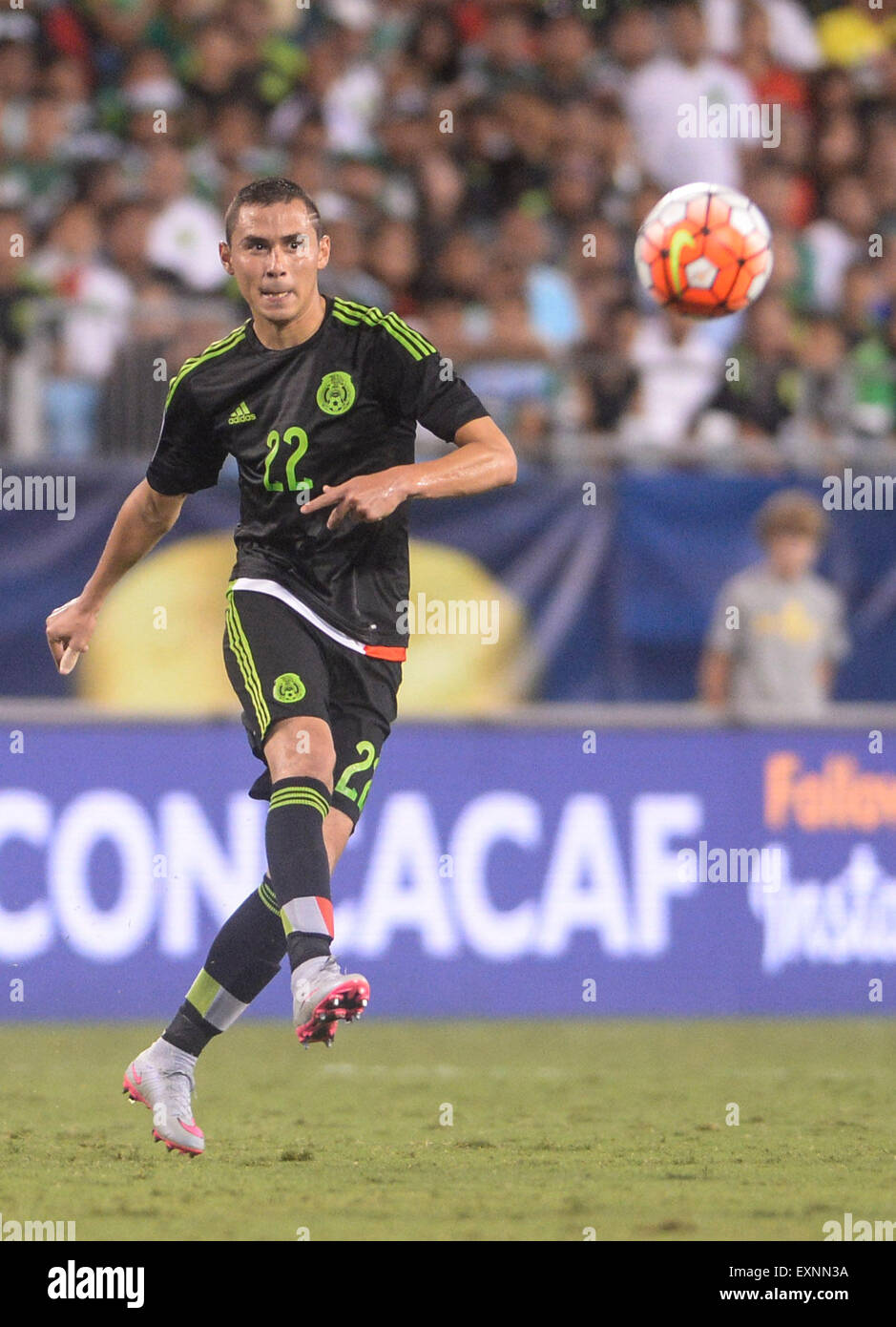 July 15, 2015:Mexico defender Paul Aguilar (22) passes the ball during the 2015 CONCACAF Gold Cup Group C match between Mexico and Trinidad & Tobago at Bank of America Stadium in Charlotte, North Carolina. PJ Ward-Brown/Cal Sport Media Stock Photo