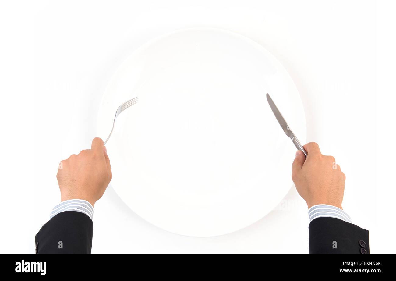 hand hold fork and knife with white plate on white background Stock